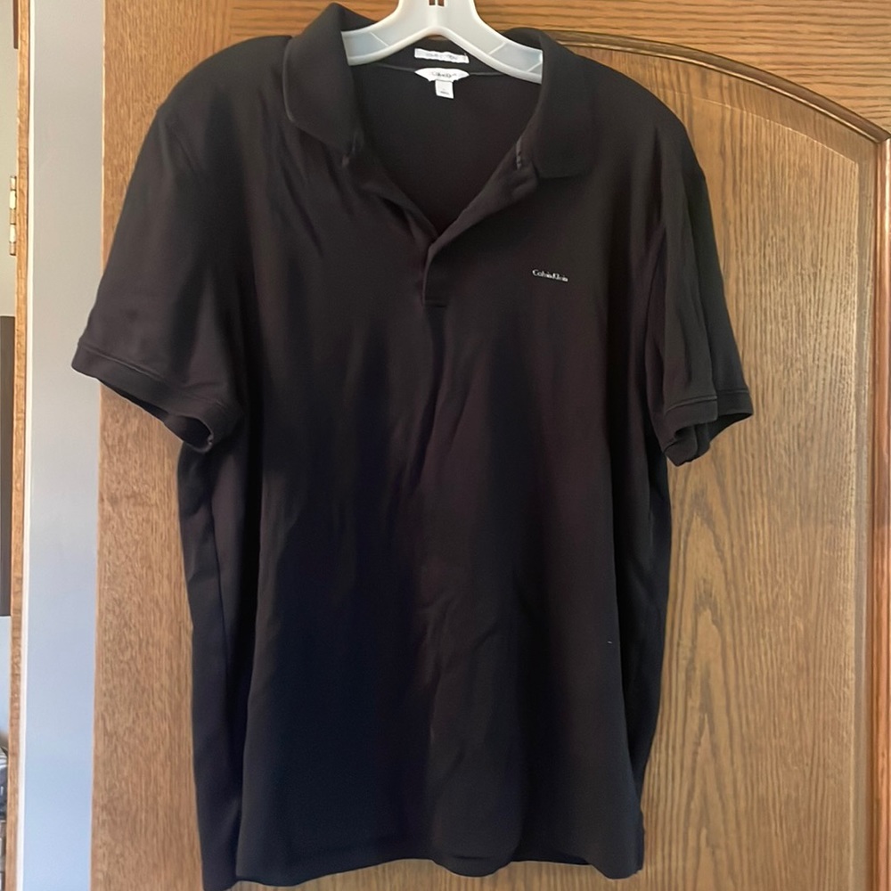 Gently worn men’s CK polo; sz L